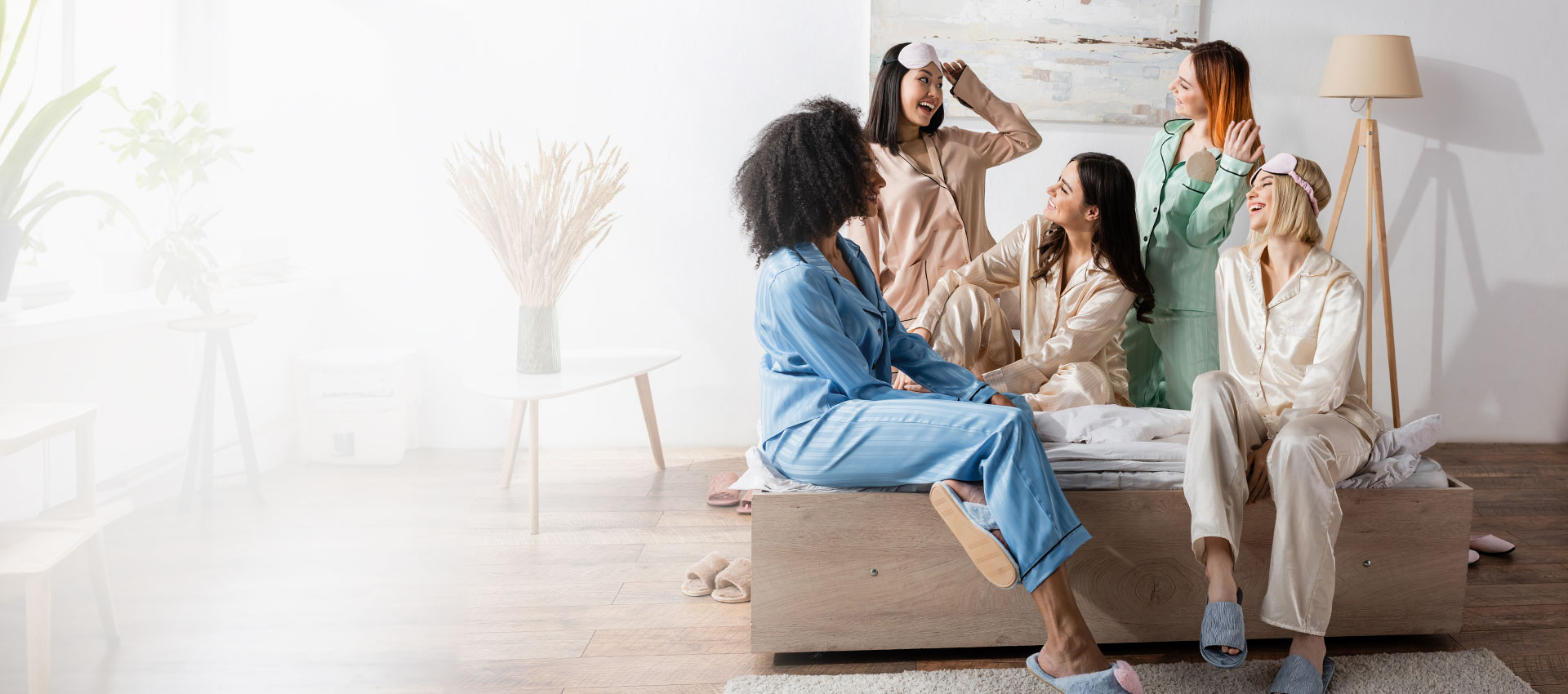 satin loungewear on bed